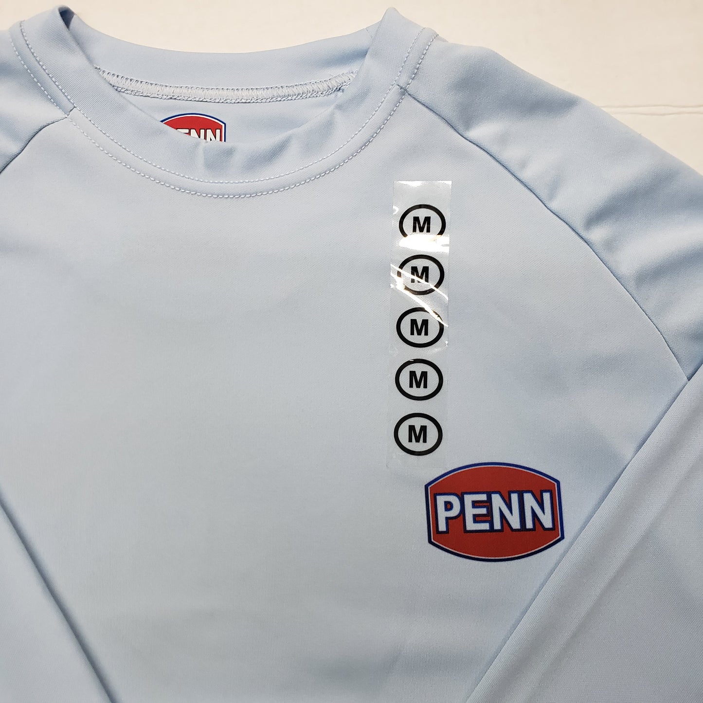Penn Long Sleeve Performance Shirt Light Blue w/ Fish Around Logo Medium