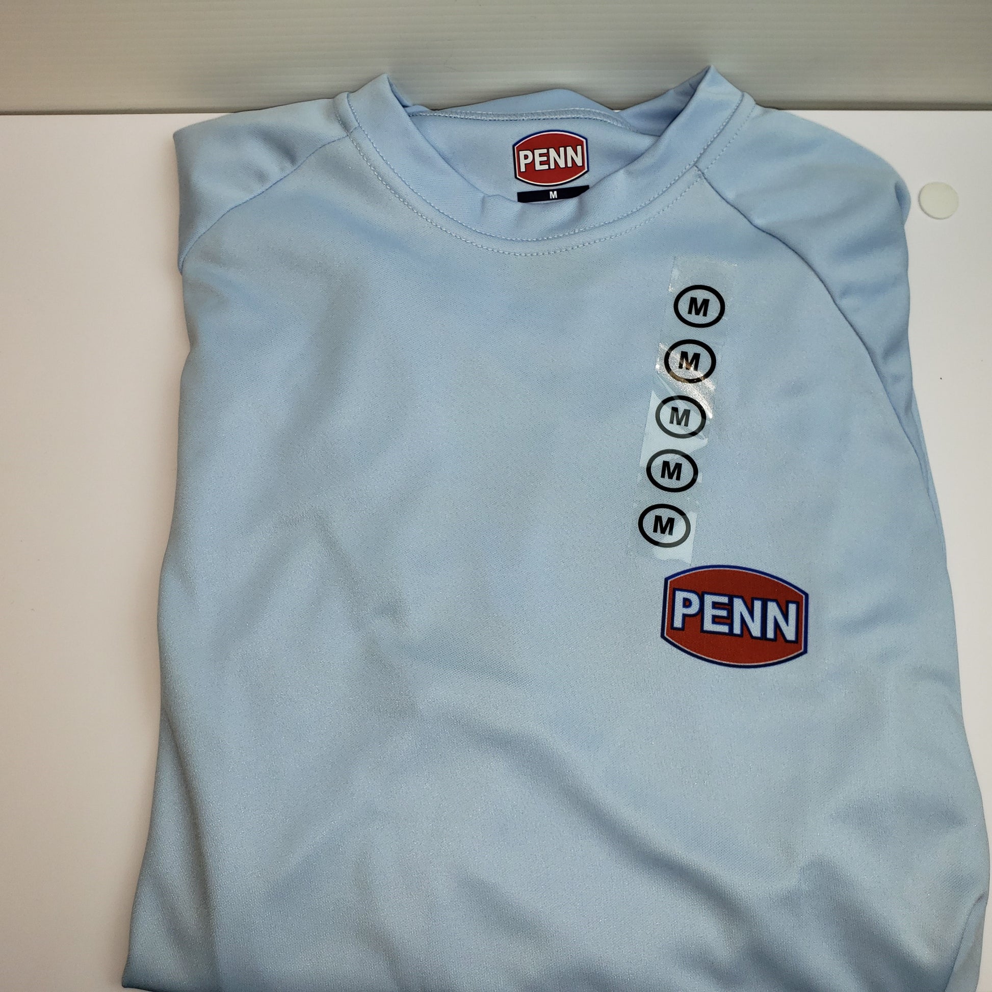 Penn Long Sleeve Performance Shirt Light Blue w/ Fish Around Logo Medium